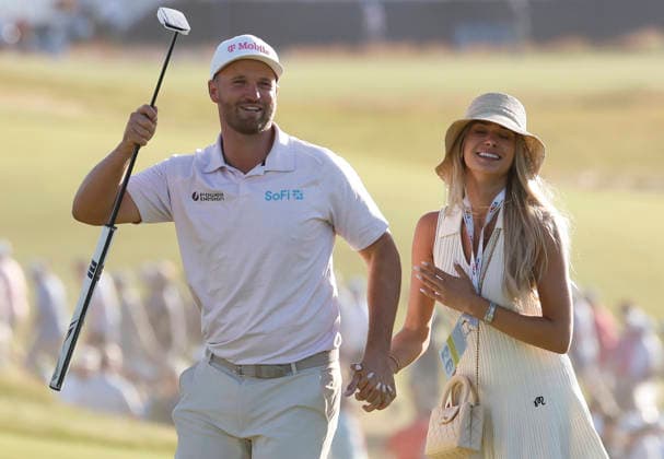 Wyndham Clark celebrates with his girlfriend Emily Tanner after winning the 126th U.S. Open Golf Championship at Shinnecock Hills Golf Club in Southampton, NY, on Sunday, June 21, 2026. Clark won with a four-under-par score of 276.  NYC20260621903 JOHNxANGELILLO
