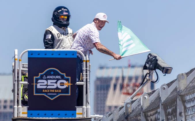 SAN DIEGO, CA - JUNE 21: Secretary of Defense Pete Hegseth waves the green flag to start the Anduril 250 NASCAR, Motorsport, USA Cup Series Race, Sunday, June 21, 2026, at Naval Base Coronado in San Diego, California. (Photo by Tony Ding Icon Sportswire) AUTO: JUN 21 NASCAR Cup Series Anduril 250 Race the Base EDITORIAL USE ONLY Icon465202606210182501