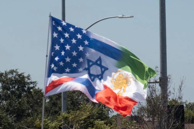 June 21, 2026, Ingelwood, California, USA: A flag coming the United States, Israel and Iran is seen as people protest the Iranian regime following the FIFA World Cup, WM, Weltmeisterschaft, Fussball 2026 Group G match between Belgium and IR Iran at Los Angeles Stadium on June 21, 2026 in Inglewood, California. Ingelwood USA - ZUMAb148 20260621_zap_b148_102 Copyright: xBryanxSmithx