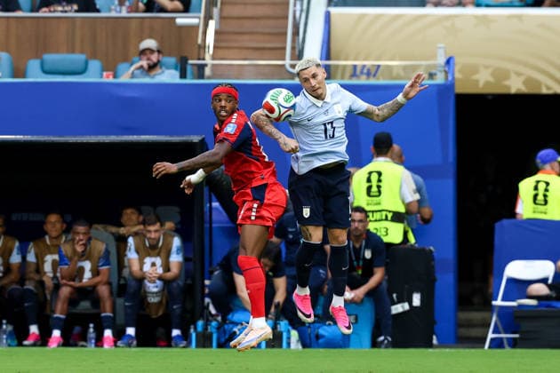 MIAMI GARDENS, FL - JUNE 21: Garry Rodrigues 11 of Cabo Verde and Guillermo Varela 13 of Uruguay battle for a ball during a FIFA World Cup, WM, Weltmeisterschaft, Fussball 2026 Group H match between Uruguay and Cabo Verde on June 21,2026 at Miami Stadium, in Miami Gardens, Fla.(Photo by Chris Arjoon Icon Sportswire) SOCCER: JUN 21 FIFA World Cup 26 Group H - Uruguay vs Cabo Verde EDITORIAL USE ONLY Icon26062100100008