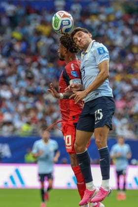 MIAMI GARDENS, FL - JUNE 21: Jamiro Monteiro 10 of Cabo Verde and Juan Manuel Sanabria 25 of Uruguay battle for a ball during a FIFA World Cup, WM, Weltmeisterschaft, Fussball 2026 Group H match between Uruguay and Cabo Verde on June 21,2026 at Miami Stadium, in Miami Gardens, Fla.(Photo by Chris Arjoon Icon Sportswire) SOCCER: JUN 21 FIFA World Cup 26 Group H - Uruguay vs Cabo Verde EDITORIAL USE ONLY Icon26062100100030
