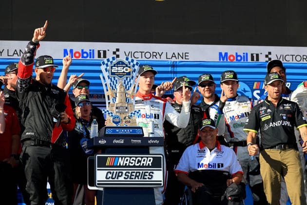 SAN DIEGO, CA - JUNE 21: Corey Heim ( 67 23XI Open MOBIL 1 O REILLY AUTO PARTS Toyota) celebrates his win in Victory Lane with his team and race sponsors after the NASCAR, Motorsport, USA Cup Series Anduril 250 Race the Base event on Sunday June 21, 2026 at the Naval Base Coronado in San Diego, CA. (Photo by David J. Griffin Icon Sportswire) AUTO: JUN 21 NASCAR Cup Series Anduril 250 Race the Base EDITORIAL USE ONLY Icon9532606211123