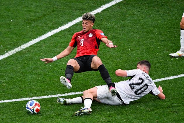 SOCCER NEW ZEALAND EGYPT WORLD CUP, Callum McCowatt of New Zealand tackles Emam Ashour of Egypt during the Group G match between New Zealand and Egypt as part of the FIFA 2026 World Cup at BC Place Vancouver, British Columbia, Canada, Monday, June 22, 2026. ( NO ARCHIVING, EDITORIAL USE ONLY, AUSTRALIA USE ONLY VANCOUVER BRITISH COLOMBIA CANADA  Copyright: xx 20260622197864864050