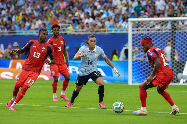 MIAMI GARDENS, FL - JUNE 21: Agustin Canobbio 14 of Uruguay, Garry Rodrigues 11 of Cabo Verde and Sidny Cabral 13 of Cabo Verde battle for a ball during a FIFA World Cup, WM, Weltmeisterschaft, Fussball 2026 Group H match between Uruguay and Cabo Verde on June 21,2026 at Miami Stadium, in Miami Gardens, Fla.(Photo by Chris Arjoon Icon Sportswire) SOCCER: JUN 21 FIFA World Cup 26 Group H - Uruguay vs Cabo Verde EDITORIAL USE ONLY Icon26062100100046