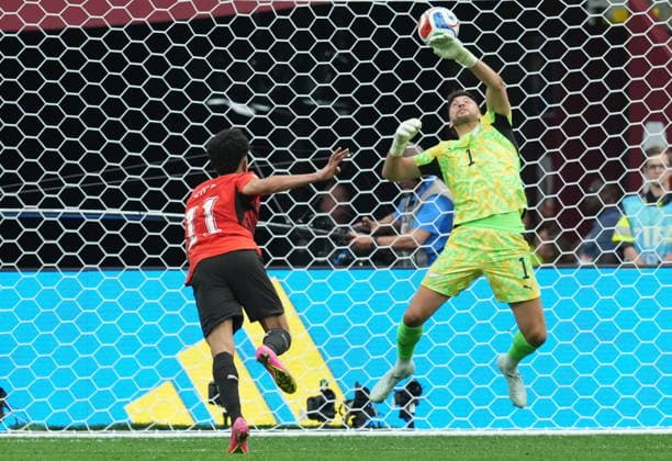 June 21, 2026, Vancouver, Bc, CANADA: Egypt s Mostafa Ziko (11) scores on New Zealand s Max Crocombe (1) during second half World Cup group G soccer action, in Vancouver, Sunday, June 21, 2026. Canada News - June 21, 2026  - ZUMAc35_ 20260621_zaf_c35_186 Copyright: xEthanxCairnsx