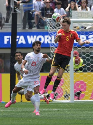 Islamic Republic of Iran Vs Belgium in Los Angeles, USA - 21 Jun 2026 Ramin Rezaeian (L) of IR Iran men football team and Maxim De Cuyper (R) of Belgium men football team seen in action during the FIFA World Cup, WM, Weltmeisterschaft, Fussball 2026 first stage Group G match between Belgium and Islamic Republic of Iran held at the Los Angeles Stadium. Final score: Belgium 0:0 Islamic Republic of Iran. Los Angeles United States Copyright: xLuisxVeniegrax xSOPAxImagesx 20260621_FIFAWC26_LuisVeniegra0289