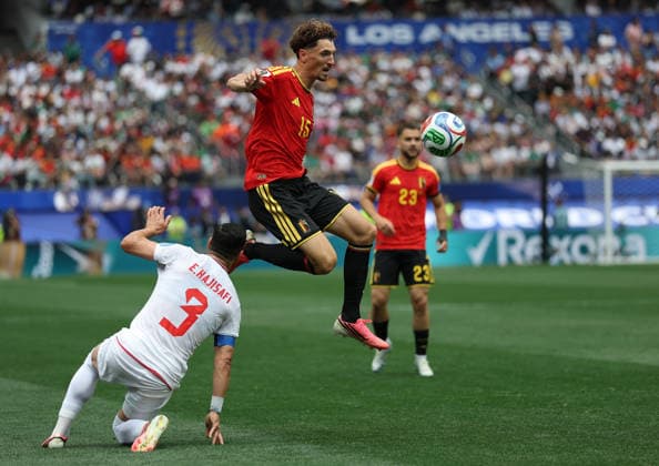 (260622) -- LOS ANGELES, June 22, 2026 -- Thomas Meunier (C) of Belgium vies with Ehsan Hajisafi (L) of Iran during a group G match between Belgium and Iran at the 2026 FIFA World Cup, WM, Weltmeisterschaft, Fussball at Los Angeles Stadium in Los Angeles, the United States, June 21, 2026. ) (SP)U.S.-LOS ANGELES-FOOTBALL-FIFA WORLD CUP-GROUP G-BEL VS IRN MaoxSiqian 
