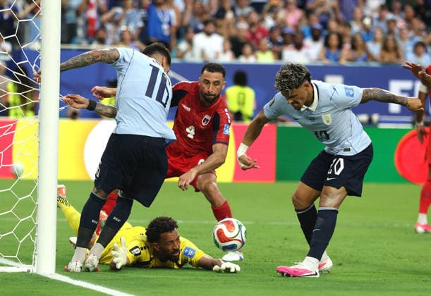(260622) -- MIAMI, June 22, 2026 -- Maximilliano Araujo (1st R) of Uruguay shoots during the group H match between Uruguay and Cape Verde at the 2026 FIFA World Cup, WM, Weltmeisterschaft, Fussball at Miami Stadium, Miami, the United States, June 21, 2026. ) (SP)U.S.-MIAMI-FOOTBALL-FIFA WORLD CUP-GROUP H-URU VS CPV XuxZijian 