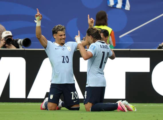 (260622) -- MIAMI, June 22, 2026 -- Maximilliano Araujo (L) of Uruguay celebrates scoring with his teammate Agust¨ªn Canobbio during the group H match between Uruguay and Cape Verde at the 2026 FIFA World Cup, WM, Weltmeisterschaft, Fussball at Miami Stadium, Miami, the United States, June 21, 2026. ) (SP)U.S.-MIAMI-FOOTBALL-FIFA WORLD CUP-GROUP H-URU VS CPV ZhangxChen 