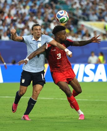 (260622) -- MIAMI, June 22, 2026 -- Agustin Canobbio (L) of Uruguay vies with Diney Borges of Cape Verde during the group H match between Uruguay and Cape Verde at the 2026 FIFA World Cup, WM, Weltmeisterschaft, Fussball at Miami Stadium, Miami, the United States, June 21, 2026. ) (SP)U.S.-MIAMI-FOOTBALL-FIFA WORLD CUP-GROUP H-URU VS CPV XuxZijian 