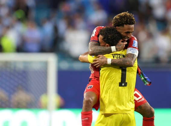 (260622) -- MIAMI, June 22, 2026 -- Vozinha (front), goalkeeper of Cape Verde, celebrates with his teammate Ryan Mendes during the group H match between Uruguay and Cape Verde at the 2026 FIFA World Cup, WM, Weltmeisterschaft, Fussball at Miami Stadium, Miami, the United States, June 21, 2026. ) (SP)U.S.-MIAMI-FOOTBALL-FIFA WORLD CUP-GROUP H-URU VS CPV ZhangxChen 