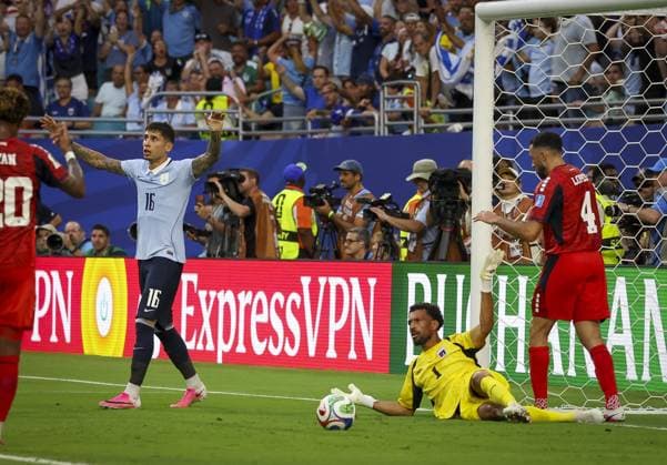 June 21, 2026, Miami Gardens, Florida, USA: Cape Verde goalkeeper Vozinha (1) and Cape Verde defender Roberto Lopes (4), far right, along with Uruguay defender MathoÂ­as Olivera (16) argue a goal call during the second half in their World Cup match Sunday, June 21, 2026 in Miami Gardens. The goal was overturned. Cape Verde and Uruguay ended in a 2-2 draw. Miami Gardens USA - ZUMAs70_ 0859685577st Copyright: xChrisxUrsox