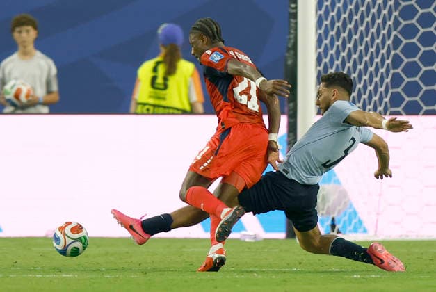 Sebastian Caceres (d) of Uruguay vies for the ball with Nuno da Costa of Cape Verde in a Group H match of the 2026 FIFA World Cup, WM, Weltmeisterschaft, Fussball between Uruguay and Cape Verde at Hard Rock Stadium in Miami, USA 21 June 2026. FIFA World Cup 2026: Uruguay - Cape Verde !ACHTUNG: NUR REDAKTIONELLE NUTZUNG!  Copyright: xAlbertoxEstevezx AMDEP7072 0859684593st