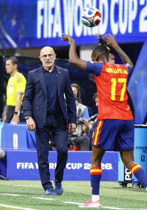 Football: 2026 World Cup Spain head coach Luis de la Fuente Castillo (L) watches his players in the second half of a World Cup Group H football match against Saudi Arabia at Atlanta Stadium in Atlanta on June 21, 2026.  A14AA0005619753P