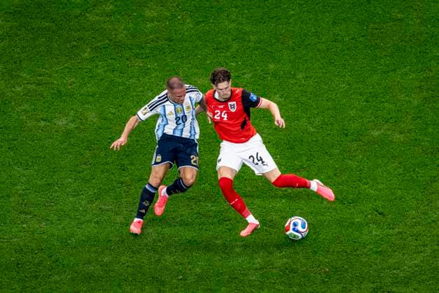 DALLAS - (lr) Alexis Mac Allister of Argentina, Paul Wanner of Austria during the 2026 World Cup at AT&T Stadium on June 22, 2026, in Dallas, United States. (Photo by Stefan Koops EYE4IMAGES DeFodi Images) - *** DALLAS — Alexis Mac Allister of Argentina and Paul Wanner of Austria during the 2026 World Cup at AT&T Stadium on June 22, 2026, in Dallas, United States. Photo by Stefan Koops, EYE4IMAGES, DeFodi Images,detected_source_language