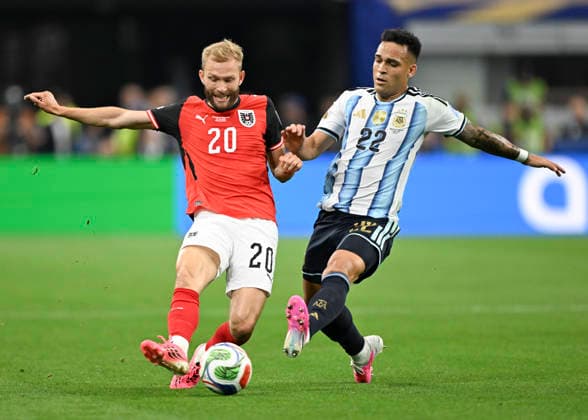 (260623) -- DALLAS, June 23, 2026 -- Lautaro Martinez (R) of Argentina vies with Konrad Laimer of Austria during the group J match between Argentina and Austria at the 2026 FIFA World Cup, WM, Weltmeisterschaft, Fussball at Dallas Stadium in Dallas, the United States, June 22, 2026. ) (SP)U.S.-DALLAS-FOOTBALL-FIFA WORLD CUP-GROUP J-ARG VS AUT ChengxMin 