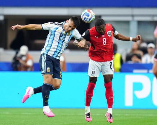 (260623) -- DALLAS, June 23, 2026 -- Lautaro Martinez (L) of Argentina vies with David Alaba of Austria during the group J match between Argentina and Austria at the 2026 FIFA World Cup, WM, Weltmeisterschaft, Fussball at Dallas Stadium in Dallas, the United States, June 22, 2026. ) (SP)U.S.-DALLAS-FOOTBALL-FIFA WORLD CUP-GROUP J-ARG VS AUT JiaxHaocheng 