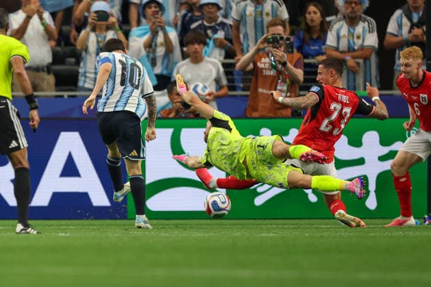 ARLINGTON, TX - JUNE 22: Marco Friedl 23 of Austria blocks a shot attempt by Lionel Messi 10 of Argentina during the FIFA World Cup, WM, Weltmeisterschaft, Fussball 2026 Group J match between Argentina and Austria on June 22, 2026, at Dallas Stadium in Dallas, Texas. (Photo by David Buono Icon Sportswire) SOCCER: JUN 22 FIFA World Cup 26 Group J - Argentina vs Austria EDITORIAL USE ONLY Icon260622060