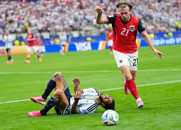 (260623) -- DALLAS, June 23, 2026 -- Nico Gonzalez of Argentina falls down during the group J match between Argentina and Austria at the 2026 FIFA World Cup, WM, Weltmeisterschaft, Fussball at Dallas Stadium in Dallas, the United States, June 22, 2026. ) (SP)U.S.-DALLAS-FOOTBALL-FIFA WORLD CUP-GROUP J-ARG VS AUT JiaxHaocheng 