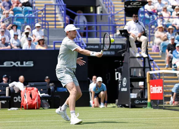 RECORD DATE NOT STATED 22nd June 2026; Devonshire Park Lawn Tennis Club, Eastbourne, East Sussex, England; Lexus Eastbourne Open Tennis, Day Three; Jack Pinnington Jones (GBR) plays a forehand shot against Camilo Ugo Carabelli (ARG) HongboxChen