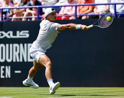 RECORD DATE NOT STATED 22nd June 2026; Devonshire Park Lawn Tennis Club, Eastbourne, East Sussex, England; Lexus Eastbourne Open Tennis, Day Three; Marcos Giron (USA) plays a backhand shot against Jack Draper (GBR) HongboxChen