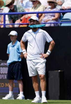 RECORD DATE NOT STATED 22nd June 2026; Devonshire Park Lawn Tennis Club, Eastbourne, East Sussex, England; Lexus Eastbourne Open Tennis, Day Three; Camilo Ugo Carabelli (ARG) bites his racket in the match against Jack Pinnington Jones (GBR) HongboxChen