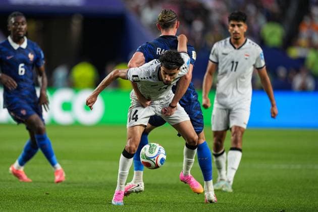 Zidane Iqbal of Iraq protects the ball from Adrien Rabiot of France France v Iraq, 2026 FIFA World Cup, WM, Weltmeisterschaft, Fussball Group I, Football, Philadelphia Stadium, Philadelphia, Pennsylvania, USA - 22 Jun 2026Philadelphia Philadelphia Stadium Pennsylvania (PA) United States of America  Copyright: xIsmaelxAdnan Shutterstockx 16950632cv