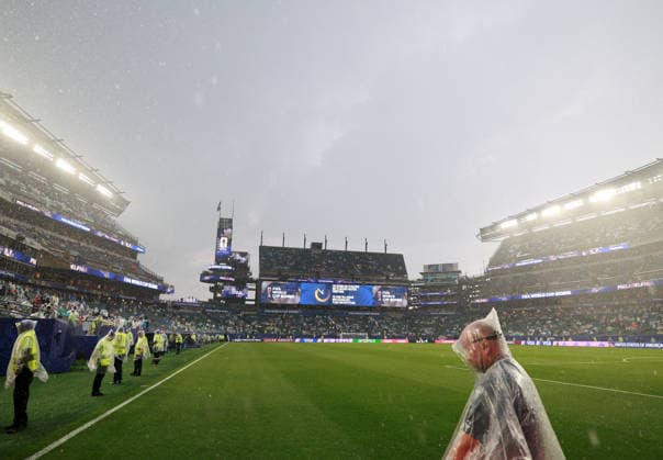 (260623) -- PHILADELPHIA, June 23, 2026 -- Staff members stand in the storm during the group I match between France and Iraq at the 2026 FIFA World Cup, WM, Weltmeisterschaft, Fussball at Philadelphia Stadium in Philadelphia, the United States, June 22, 2026. ) (SP)U.S.-PHILADELPHIA-FOOTBALL-FIFA WORLD CUP-GROUP I-FRA VS IRQ HuxXingyu 
