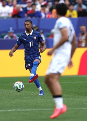 (260623) -- PHILADELPHIA, June 23, 2026 -- Michael Olise (L) of France competes during the group I match between France and Iraq at the 2026 FIFA World Cup, WM, Weltmeisterschaft, Fussball at Philadelphia Stadium in Philadelphia, the United States, June 22, 2026. ) (SP)U.S.-PHILADELPHIA-FOOTBALL-FIFA WORLD CUP-GROUP I-FRA VS IRQ HuxXingyu 
