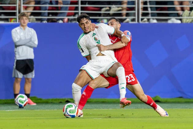 SANTA CLARA, CA - JUNE 22: Fares Chaibi 10 of Algeria and Ehsan Haddad 23 of Jordan fight for the ball during the FIFA World Cup, WM, Weltmeisterschaft, Fussball Group J match between Jordan and Algeria on June 22, 2026 at San Francisco Bay Area Stadium in Santa Clara, CA. (Photo by Bob Kupbens Icon Sportswire) SOCCER: JUN 22 FIFA World Cup 26 Group J - Jordan vs Algeria EDITORIAL USE ONLY Icon260622033