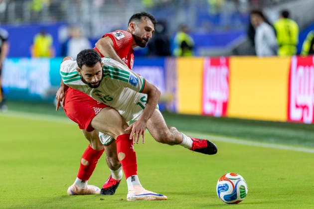 SANTA CLARA, CA - JUNE 22: Rayan Ait-Nouri 15 of Algeria is fouled by Ehsan Haddad 23 of Jordan during the FIFA World Cup, WM, Weltmeisterschaft, Fussball Group J match between Jordan and Algeria on June 22, 2026 at San Francisco Bay Area Stadium in Santa Clara, CA. (Photo by Bob Kupbens Icon Sportswire) SOCCER: JUN 22 FIFA World Cup 26 Group J - Jordan vs Algeria EDITORIAL USE ONLY Icon260622059