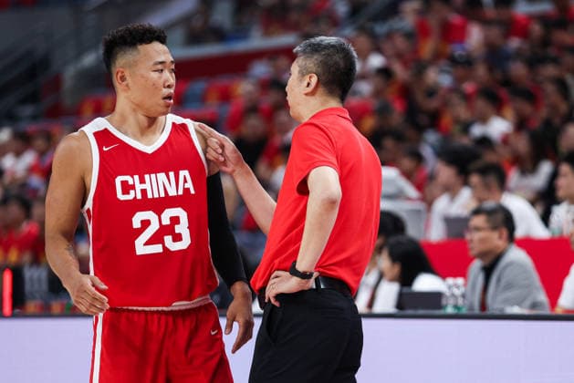 HANGZHOU, CHINA - JUNE 23: Head coach Guo Shiqiang of Team China talks with He Xining 23 during a training session for the 2026 men s basketball warm-up match on June 23, 2026 in Hangzhou, Zhejiang Province of China. Team China is preparing for the upcoming warm-up game against the Netherlands.  Copyright: xVCGx 111649957515