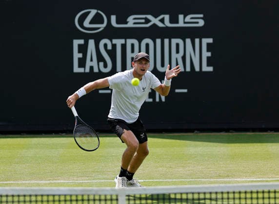 RECORD DATE NOT STATED 23rd June 2026; Devonshire Park Lawn Tennis Club, Eastbourne, East Sussex, England; Lexus Eastbourne Open Tennis, Day Three; Hamish Stewart (GBR) plays a backhand shot against Thiago Agustin Tirante (ARG) HongboxChen