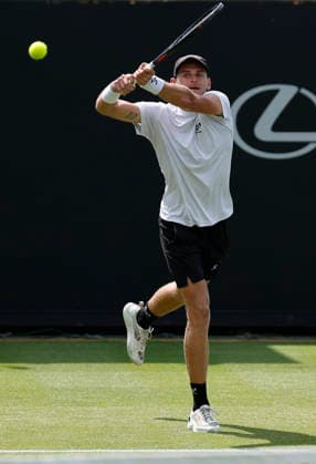 RECORD DATE NOT STATED 23rd June 2026; Devonshire Park Lawn Tennis Club, Eastbourne, East Sussex, England; Lexus Eastbourne Open Tennis, Day Three; Hamish Stewart (GBR) plays a backhand shot against Thiago Agustin Tirante (ARG) HongboxChen