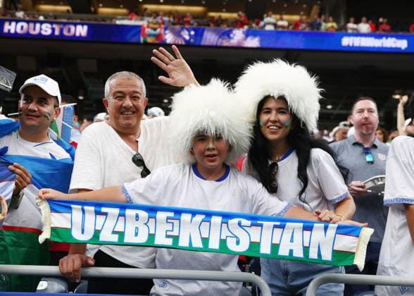 Fan s of Uzbekistan show their support before the start of a FIFA World Cup, WM, Weltmeisterschaft, Fussball match against Portugal at Houston Stadium in Houston, Texas, on Tuesday, June 23, 2026.  HOU20260623905 CHRISTIANxBRUNSKILL