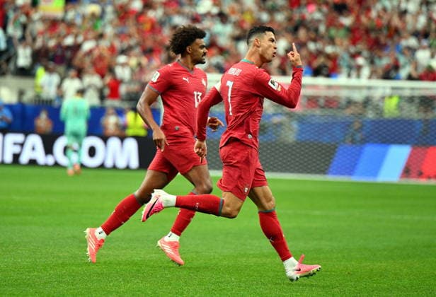 FIFA World Cup, WM, Weltmeisterschaft, Fussball 2026 - Group K - Portugal vs Uzbekistan Cristiano Ronaldo of Portugal (R) celebrates scoring the 1-0 during the FIFA World Cup 2026 group stage match Portugal against Uzbekistan, in Houston, USA, 23 June 2026. HOUSTON United States  Copyright: xSAMxWASSONx