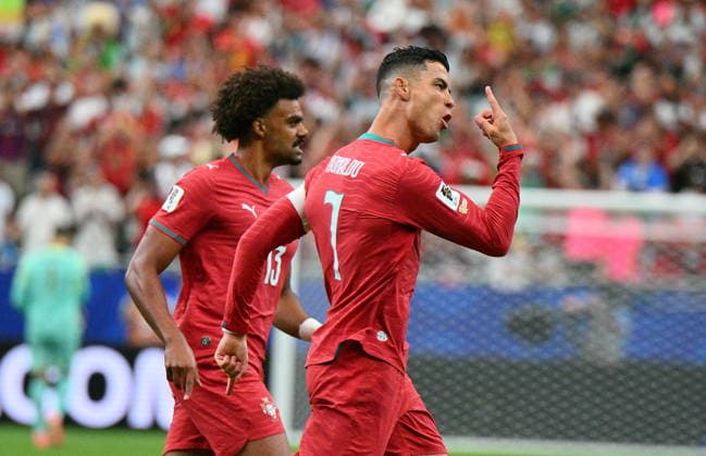 FIFA World Cup, WM, Weltmeisterschaft, Fussball 2026 - Group K - Portugal vs Uzbekistan Cristiano Ronaldo of Portugal (R) celebrates scoring the 1-0 during the FIFA World Cup 2026 group stage match Portugal against Uzbekistan, in Houston, USA, 23 June 2026. HOUSTON United States  Copyright: xSAMxWASSONx