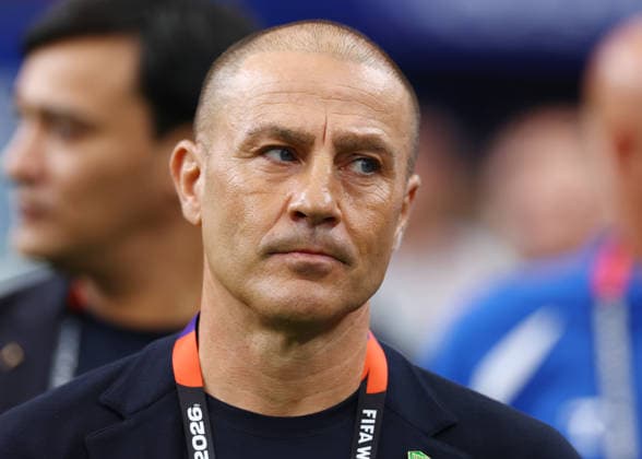 Uzbekistan s head coach Fabio Cannavaro waits on the sideline before the start of a FIFA World Cup, WM, Weltmeisterschaft, Fussball match against Portugal at Houston Stadium in Houston, Texas, on Tuesday, June 23, 2026.  HOU20260623913 CHRISTIANxBRUNSKILL