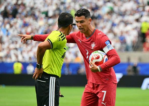 FIFA World Cup, WM, Weltmeisterschaft, Fussball 2026 - Group K - Portugal vs Uzbekistan Cristiano Ronaldo of Portugal argues with the referee during the FIFA World Cup 2026 group stage match Portugal against Uzbekistan, in Houston, USA, 23 June 2026. HOUSTON United States  Copyright: xSAMxWASSONx
