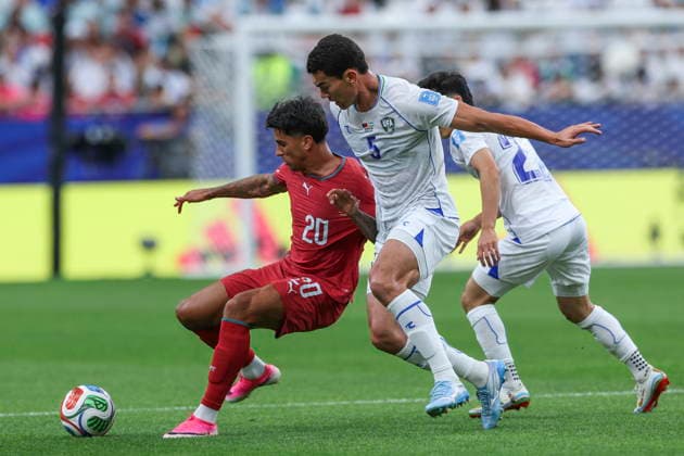 FIFA World Cup, WM, Weltmeisterschaft, Fussball 2026 - Portugal vs Uzbekistan Portugal s Joao Cancelo (L) fights for the ball with Uzbekistan s Ashurmatov during their FIFA World Cup 2026 Group K soccer match at Houston Stadium, Texas, USA, 23 June 2026. Houston Texas UNITED STATES  Copyright: xMIGUELxA.xLOPESx
