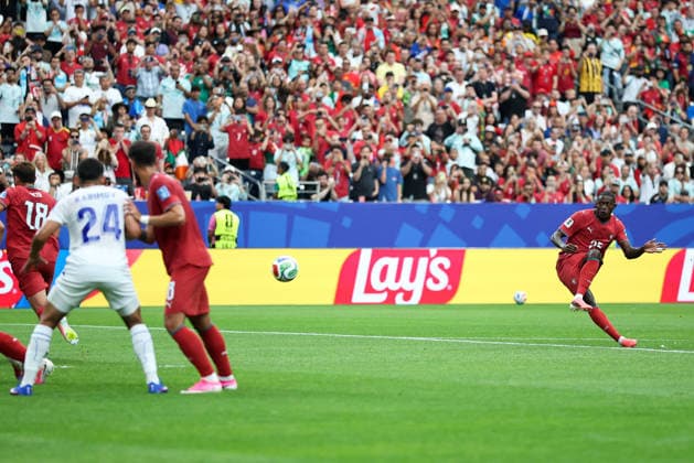 (260624) -- HOUSTON, June 24, 2026 -- Nuno Mendes (1st R) of Portugal shoots to score during the group K match between Portugal and Uzbekistan at the 2026 FIFA World Cup, WM, Weltmeisterschaft, Fussball at Houston Stadium in Houston, the United States, June 23, 2026. ) (SP)U.S.-HOUSTON-FOOTBALL-FIFA WORLD CUP-GROUP K-POR VS UZB LixMing 