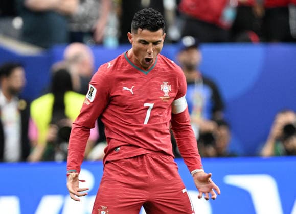 (260624) -- HOUSTON, June 24, 2026 -- Cristiano Ronaldo of Portugal celebrates scoring during the group K match between Portugal and Uzbekistan at the 2026 FIFA World Cup, WM, Weltmeisterschaft, Fussball at Houston Stadium in Houston, the United States, June 23, 2026. ) (SP)U.S.-HOUSTON-FOOTBALL-FIFA WORLD CUP-GROUP K-POR VS UZB XiaoxYijiu 