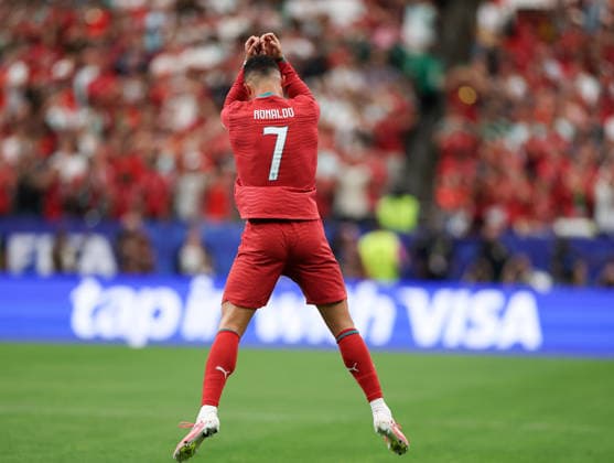 (260624) -- HOUSTON, June 24, 2026 -- Cristiano Ronaldo of Portugal celebrates scoring during the group K match between Portugal and Uzbekistan at the 2026 FIFA World Cup, WM, Weltmeisterschaft, Fussball at Houston Stadium in Houston, the United States, June 23, 2026. ) (SP)U.S.-HOUSTON-FOOTBALL-FIFA WORLD CUP-GROUP K-POR VS UZB LixMing 