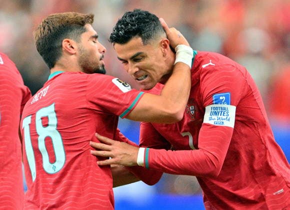 FIFA World Cup, WM, Weltmeisterschaft, Fussball 2026 - Group K - Portugal vs Uzbekistan Portugal s Cristiano Ronaldo (R) celebrates after scoring a goal with teammate Pedro Neto of during the FIFA World Cup 2026 group stage match Portugal against Uzbekistan, in Houston, USA, 23 June 2026. HOUSTON United States  Copyright: xSAMxWASSONx