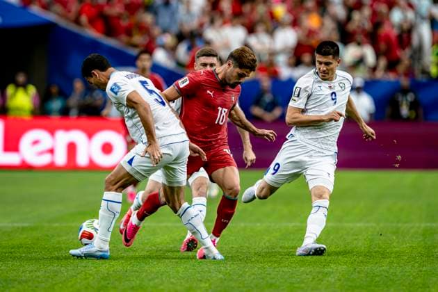 HOUSTON - (lr) Rustam Ashurmatov of Uzbekistan, Pedro Neto of Portugal, Odiljon Xamrobekov of Uzbekistan during the 2026 World Cup at NRG Stadium on June 23, 2026 in Houston, United States. (Photo by Stefan Koops EYE4IMAGES DeFodi Images) - *** HOUSTON — Rustam Ashurmatov of Uzbekistan, Pedro Neto of Portugal, and Odiljon Xamrobekov of Uzbekistan during the 2026 World Cup at NRG Stadium on June 23, 2026, in Houston, United States. Photo by Stefan Koops, EYE4IMAGES, DeFodi Images,detected_source_language