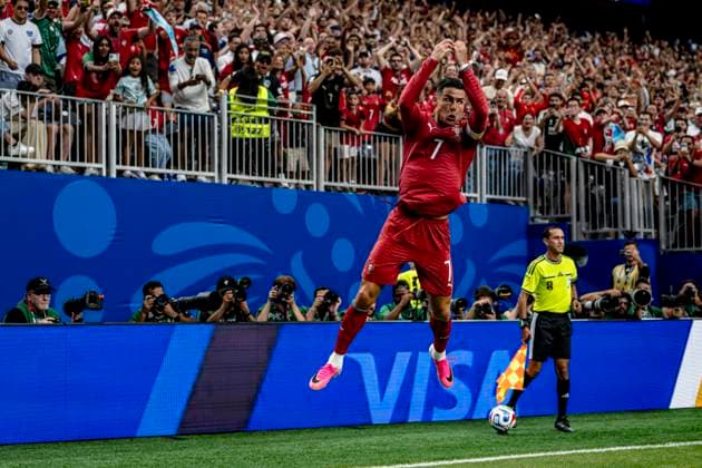 HOUSTON - Cristiano Ronaldo of Portugal celebrates his second goal to make it 3-0 during the 2026 World Cup at NRG Stadium on June 23, 2026, in Houston, United States. (Photo by Stefan Koops EYE4IMAGES DeFodi Images) - *** HOUSTON Cristiano Ronaldo of Portugal celebrates his second goal, making the score 3–0, during the 2026 World Cup at NRG Stadium on June 23, 2026, in Houston, United States. Photo by Stefan Koops, EYE4IMAGES, DeFodi Images,detected_source_language