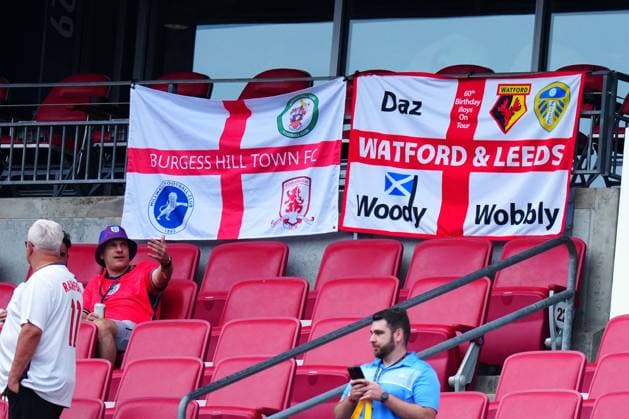 EFL club flags amongst the England fans England v Ghana, 2026 FIFA World Cup, WM, Weltmeisterschaft, Fussball Group L, Football, Boston Stadium, Foxborough, Massachusetts, USA - 23 Jun 2026Foxborough Boston Stadium Massachusetts (MA) United States of America EDITORIAL USE ONLY No use with unauthorised audio, video, data, fixture lists, club league logos or live services. Online in-match use limited to 120 images, no video emulation. No use in betting, games or single club league player publications.  Copyright: xJavierxGarcia Shutterstockx 16956021u