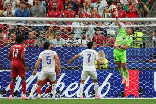 HOUSTON, TX - JUNE 23: Abduvohid Nematov 12 of Uzbekistan punches away a crossing ball during the FIFA World Cup, WM, Weltmeisterschaft, Fussball 2026 Group K match between Portugal and Uzbekistan on June 23, 2026, at Houston Stadium in Houston, Texas. (Photo by David Buono Icon Sportswire) SOCCER: JUN 23 FIFA World Cup 26 Group K - Portugal vs Uzbekistan EDITORIAL USE ONLY Icon260623022