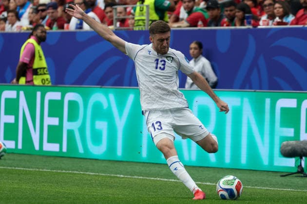 HOUSTON, TX - JUNE 23: Sherzod Nasrullaev 13 of Uzbekistan crosses the ball during the FIFA World Cup, WM, Weltmeisterschaft, Fussball 2026 Group K match between Portugal and Uzbekistan on June 23, 2026, at Houston Stadium in Houston, Texas. (Photo by David Buono Icon Sportswire) SOCCER: JUN 23 FIFA World Cup 26 Group K - Portugal vs Uzbekistan EDITORIAL USE ONLY Icon260623032