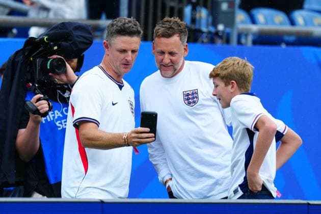 Justin Rose and Luke Donald take photos of each other ahead of kick-off England v Ghana, 2026 FIFA World Cup, WM, Weltmeisterschaft, Fussball Group L, Football, Boston Stadium, Foxborough, Massachusetts, USA - 23 Jun 2026Foxborough Boston Stadium Massachusetts (MA) United States of America EDITORIAL USE ONLY No use with unauthorised audio, video, data, fixture lists, club league logos or live services. Online in-match use limited to 120 images, no video emulation. No use in betting, games or single club league player publications.  Copyright: xJavierxGarcia Shutterstockx 16956021am